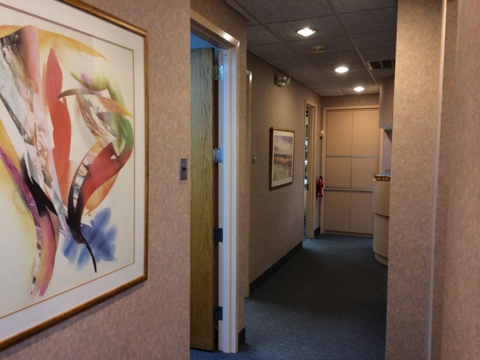 Holbrook office hall art - Suffolk Oral Surgery Associates